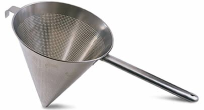 A strainer with medium perforation, conical shape, round handle, a hanging hook opposite the handle.